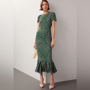 RHODE Lulani Printed Maxi Dress puffed sleeves and a flouncy hem. Career wedding